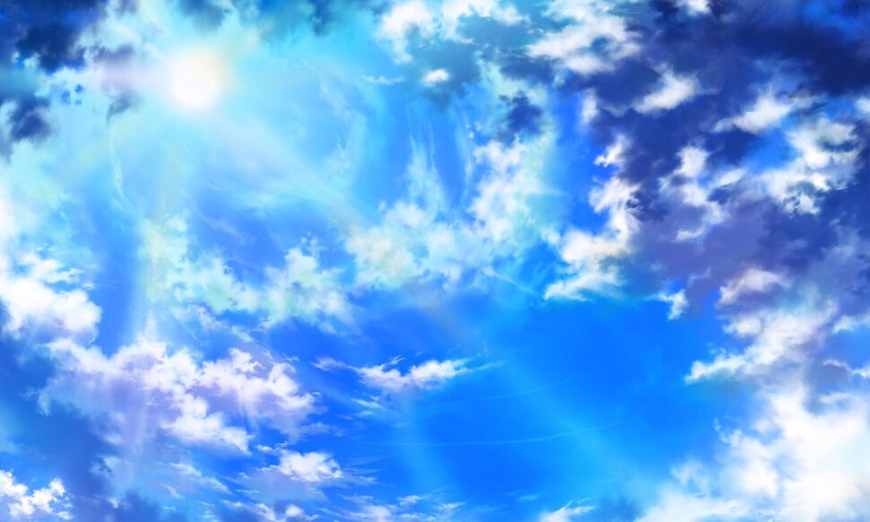 Яркое солнце в голубом небе с облаками