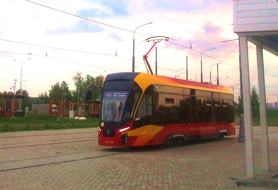 По городу