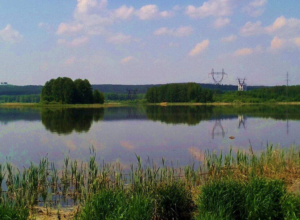 У реки