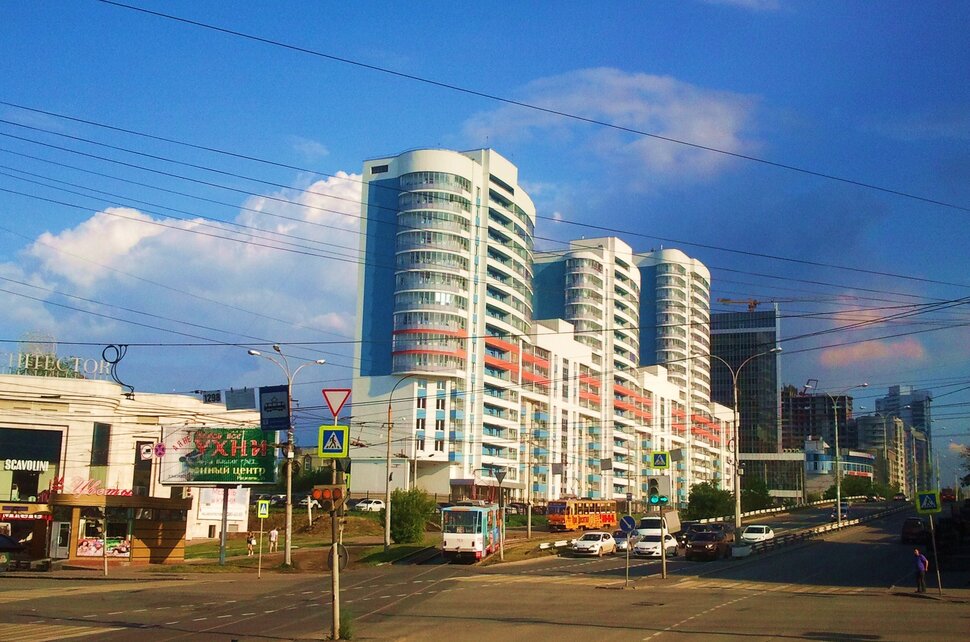 По проспекту