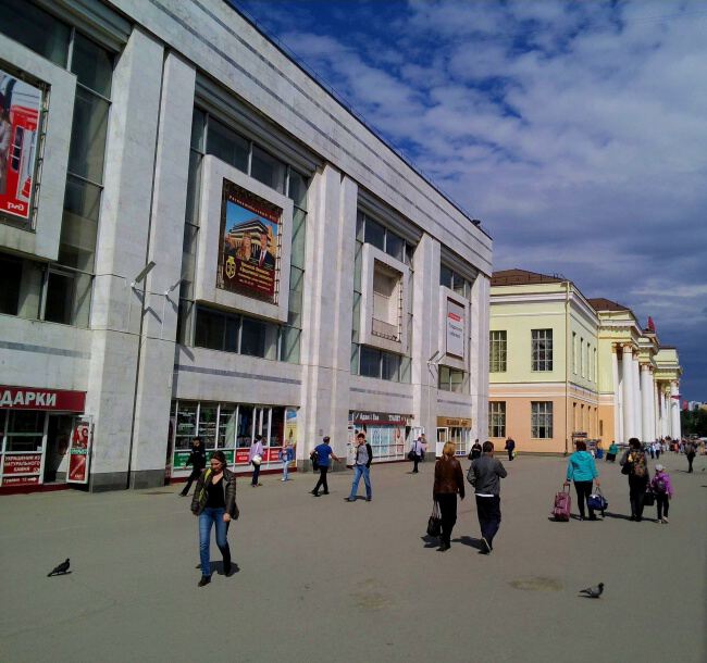По городу