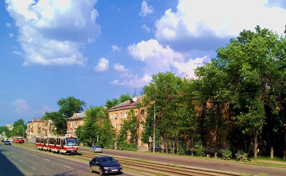 По проспекту