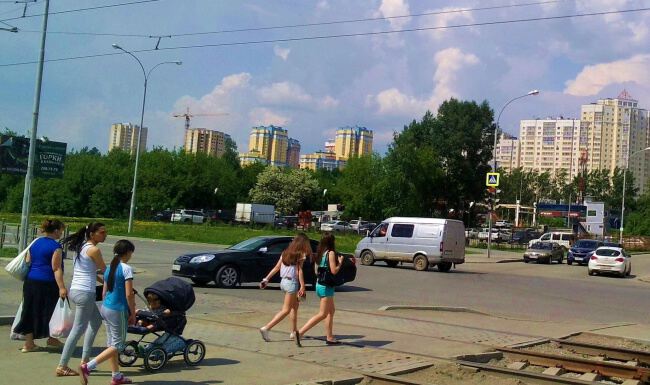 По городу