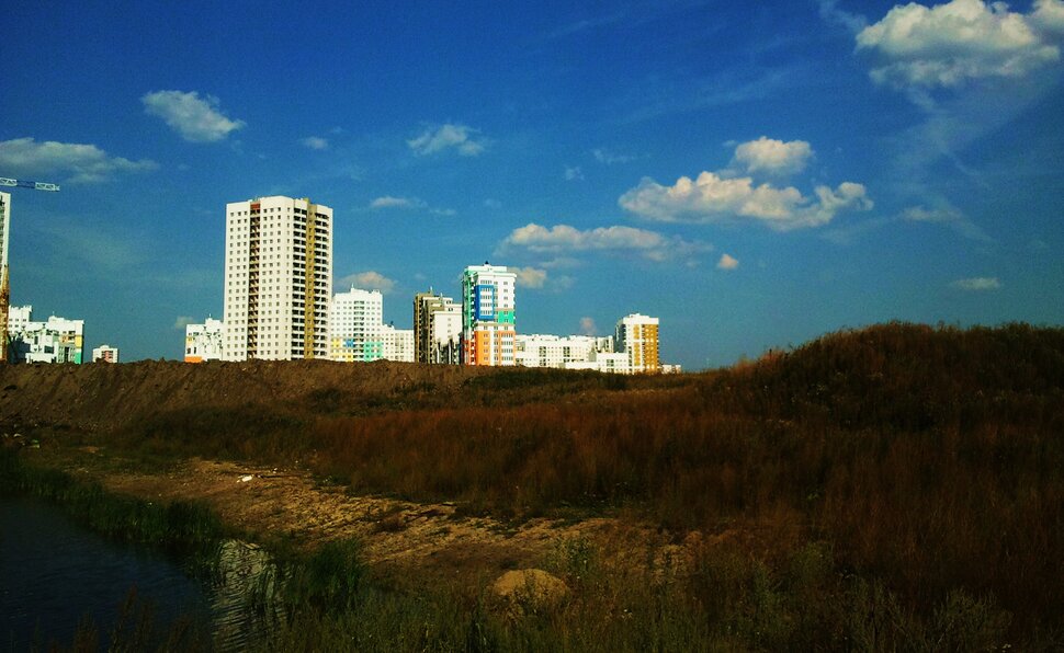 У города