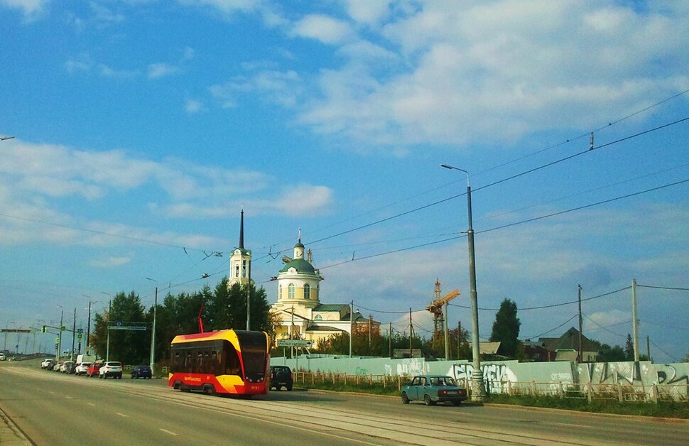 По проспекту