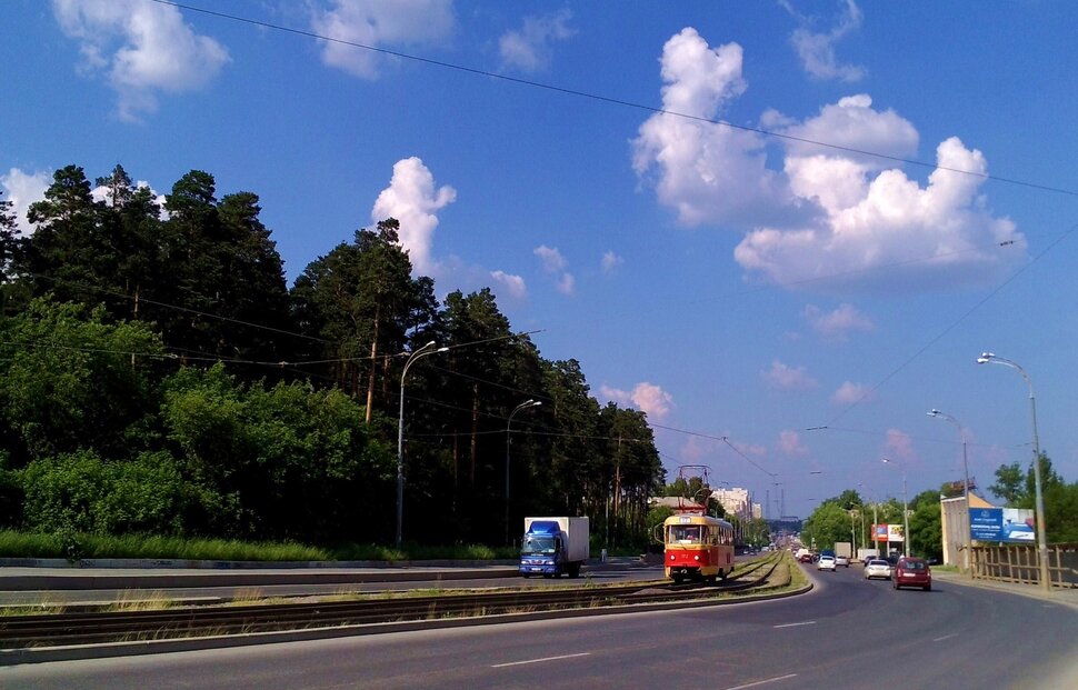 По проспекту
