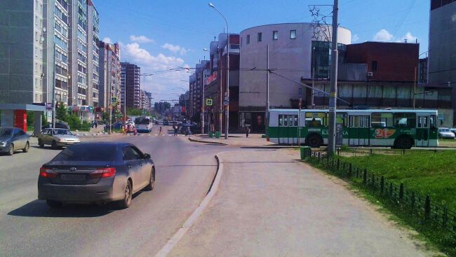 По городу